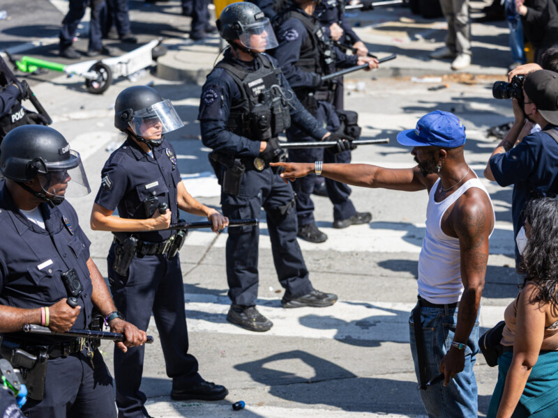 A man confronts police at the law enforcement line on Temple and Alameda Streets during anti-ICE protests in downtown Los Angeles on June 8. Ethan Cohen | Long Beach Current
